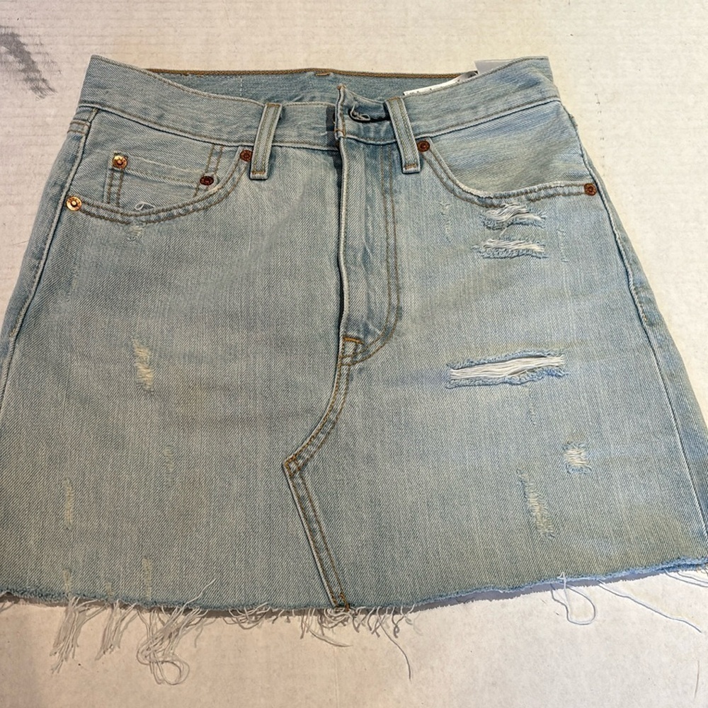 Levi’s light wash Mini skirt in size 24 or.xs